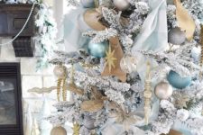 19 blue and gold decor is ideal for a white Christmas tree