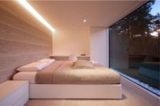 19 hidden lighting above the bed provides additional light for reading