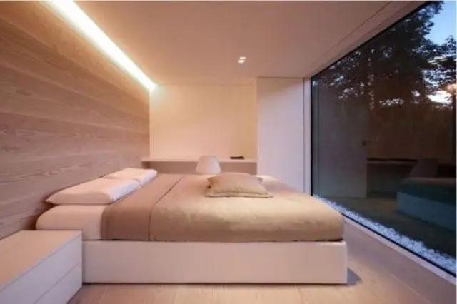 hidden lighting above the bed provides additional light for reading