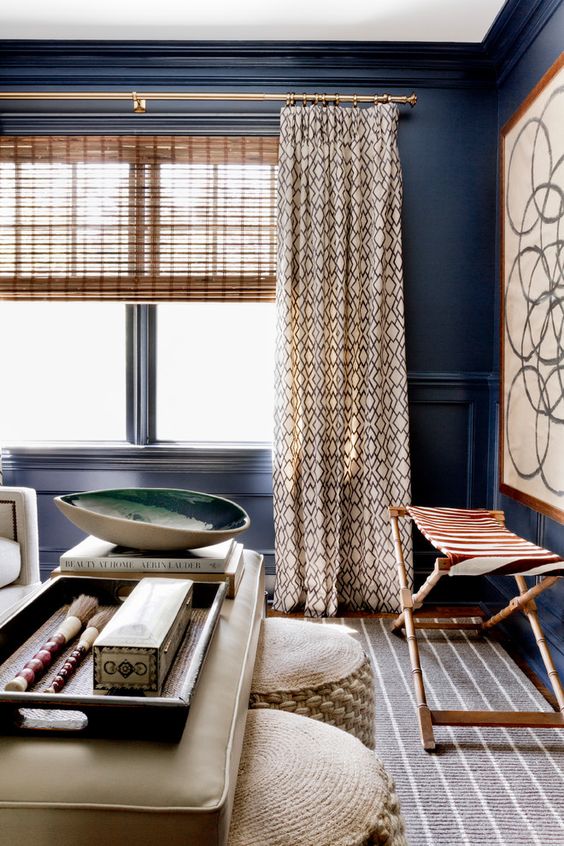 textural decor in neutral beige and brown, blue walls