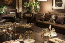 20 dark chocolate living room with metallic accents and greenery