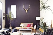 20 dark purple accent wall accentuates this living room and makes it mysterious and unique