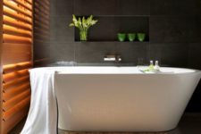 20 serene and luxurious, this Zen bathroom centres around a freestanding tub