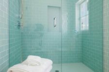 accent your shower space with mint-colored subway tiles, which raise the spirits and add color to the space
