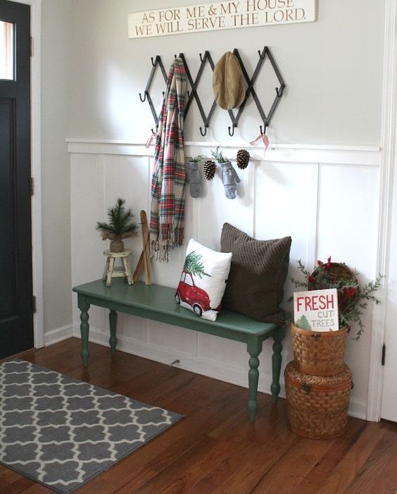 Place a couple of baskets and a pinecone garland to make the entryway winter like