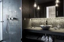 23 black modern bathroom with a concrete countertop and a tiled shower