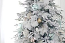 23 fluffy snowy tree with pastel ornaments