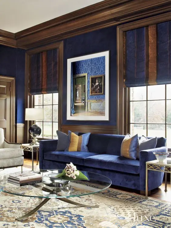 royal blue living room with rich brown and creamy accents