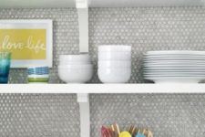 24 neutral grey penny tiles look cool with colorful tableware