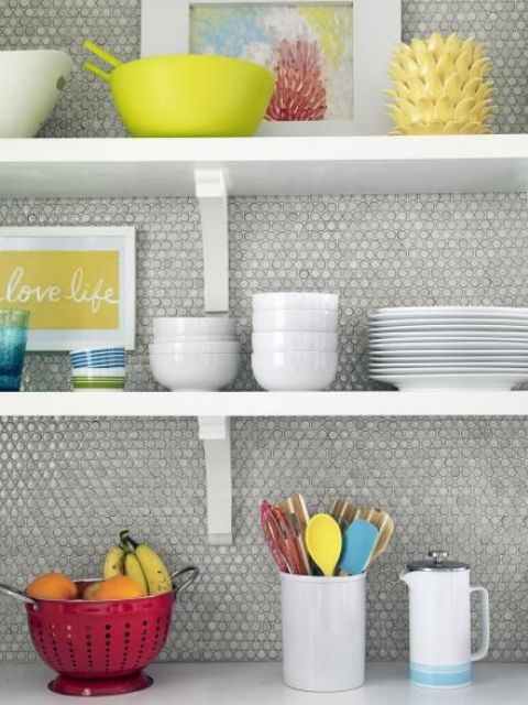 neutral grey penny tiles look cool with colorful tableware