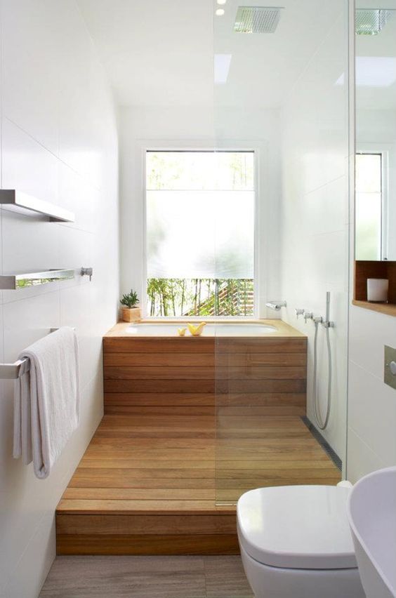 cover a usual soaking tub with wood and the shower space also to achieve that Japanese-inspired look