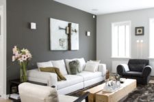 25 dark grey accent wall and light grey other walls, neutral furniture