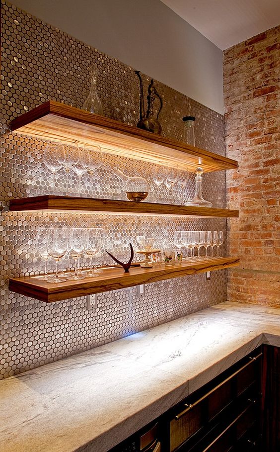 smart lighting to highlight architextural features, penny tiles reflect the light