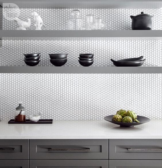 this modern kitchen looks stylish white penny tiles and grey sleek shelves