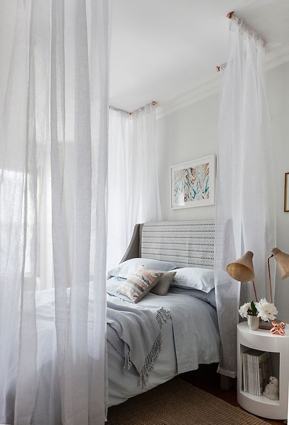 dreamy canopy over the bed looks very romantic