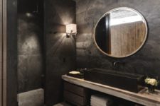 28 moody bathroom with a huge sink, wooden floor and cabinets