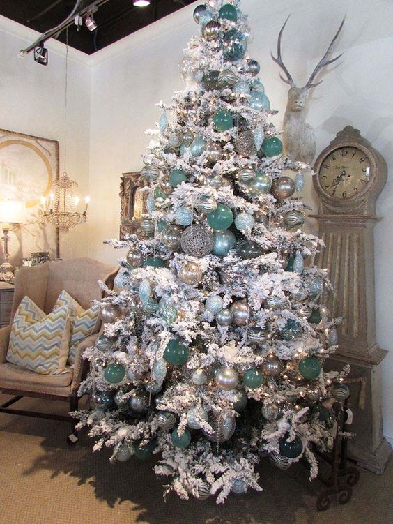 snow white tree with aqua and silver ornaments