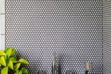 28 white penny tiles with black grout will add texture to your decor