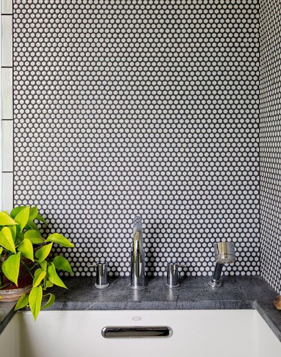 white penny tiles with black grout will add texture to your decor