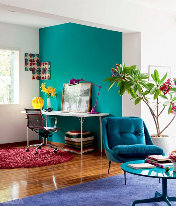 vibrant turquoise wall to highlight and separate the home office nook