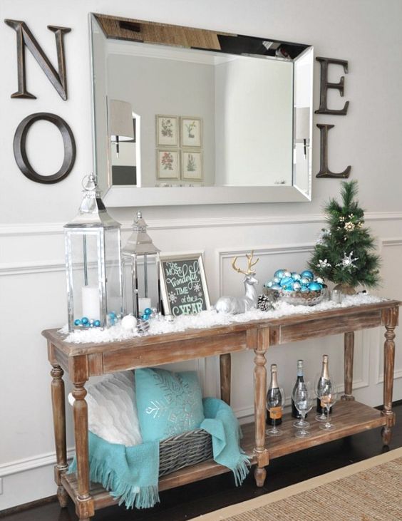 light blue ornaments and a pillow with a snowflake