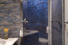 35 to add color to the shower, the designers used cobalt blue glazed hexagonal tiles