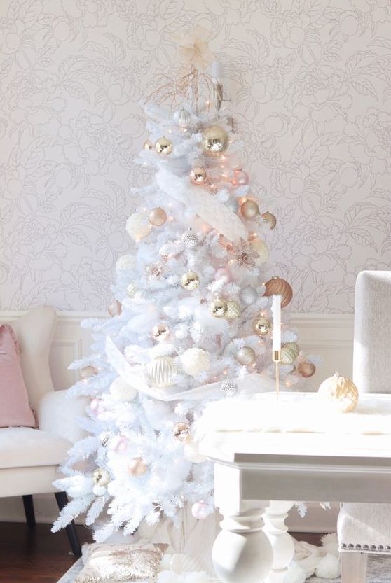 an enchanting Christmas tree with blush, gold and white ornaments and ribbons is a dreamy and beautiful idea