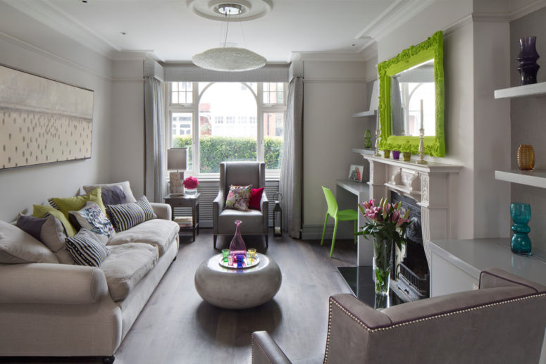 A very neutral gray room with a taupe wallpaper but bright lime pops. (Emma Green Design)