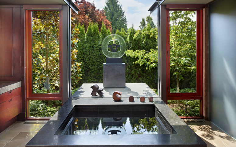 a sunken bath overlooking a stylish zen-garden makes this amazing bathroom a perfect room for relaxation (Garret Cord Werner Architects &amp; Interior Designers)