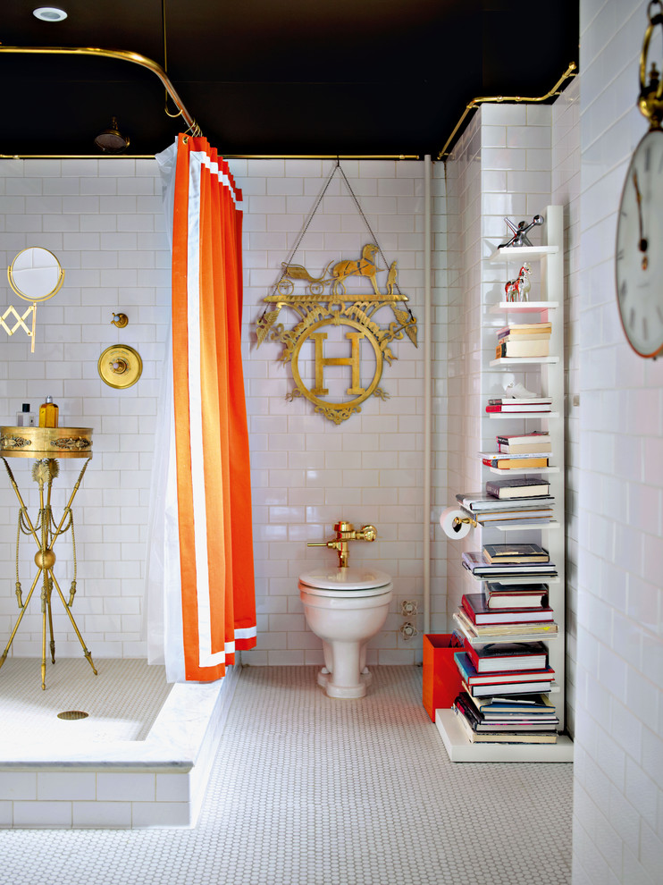 plain white tiles need some bold accessories like an orange shower curtain (Room by Simon Doonan and Jonathan Adler. Photography by Debi Treloar)