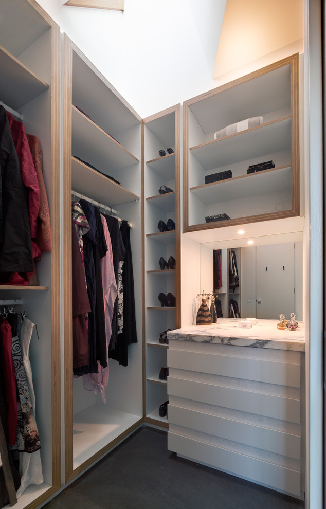 even a small mirror is a great addition to a neatly organized closet (Mihaly Slocombe)