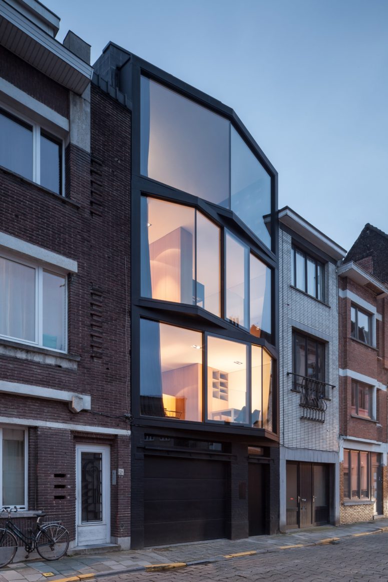 Abeel House was built on a narrow plot and its amazing feature is angled glazing frames