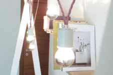 02 The desk leaves floor space unused and you can hang various lights, shelves and planters on the holder
