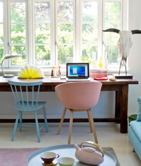 The furniture is mid century modern and cute, it makes the home office welcoming