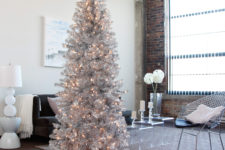02 a tall shiny silver tree will perfecly fit a modern space, just add some lights for a sparkling look