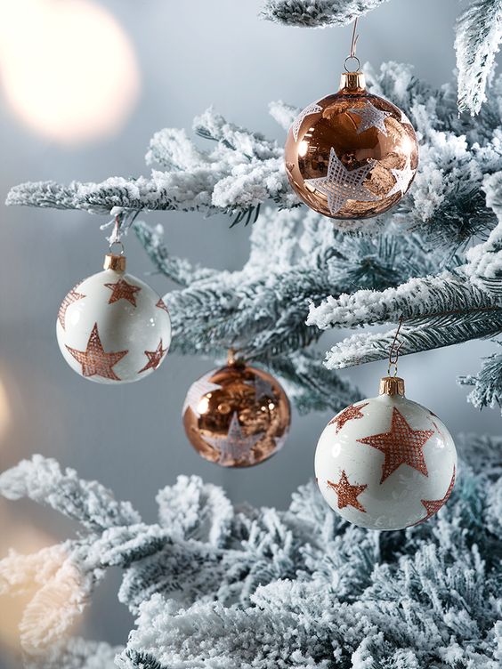 amazing ivory and copper star ornaments for decorating your tree