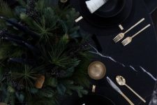 02 black tablescape with moody evergreens and black candles