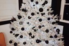03 a crispy white tree with black matte and glossy ornaments