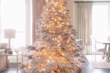 03 a large flocked tree with lights – you don’t need any ornaments