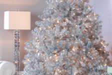 03 a large silver tree with lights will flatter a neutral or a pastel space fitting the look