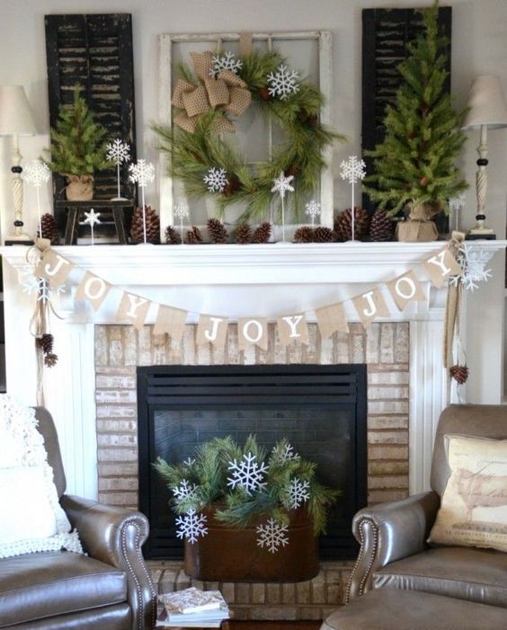 organic decorated mantel with pinecones, evergreens and burlap is ideal if you want something rustic