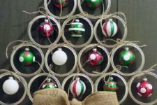 05 mason jar lid door hanger with ornaments and a burlap bow