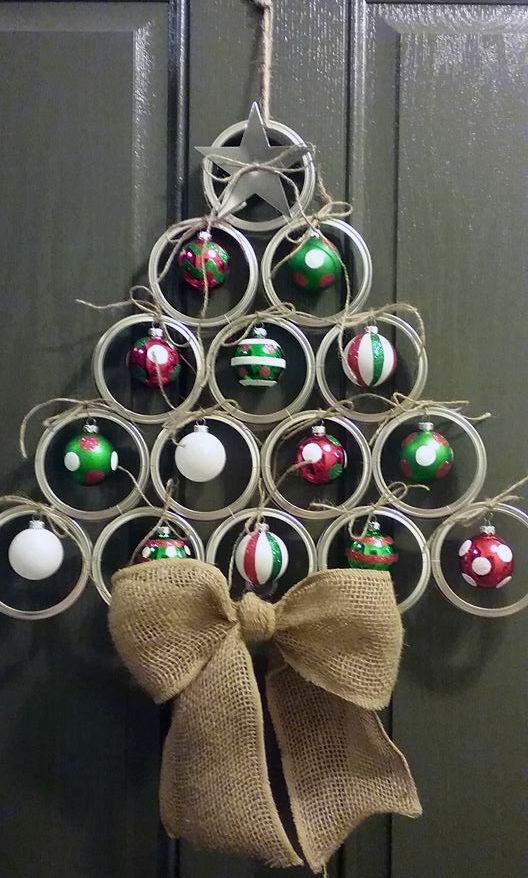 mason jar lid door hanger with ornaments and a burlap bow