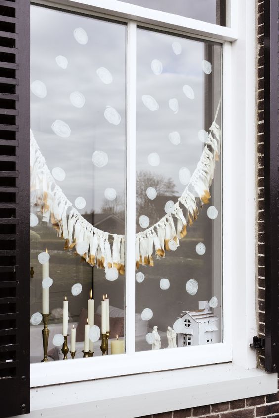 painted snow and white and gold tassel garland