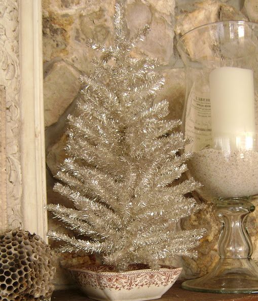 small silver tinsel tree in a bowl for vintage decor
