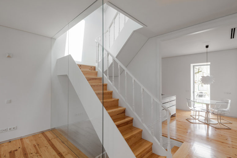 The interior went back to its spacial and functional layout, wooden floors and ceiling structures and the  staircase