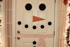 06 turn your door into a snowman to excite your children