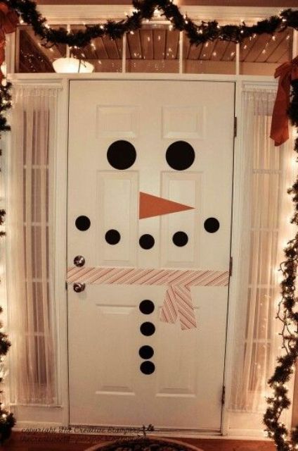turn your door into a snowman to excite your children