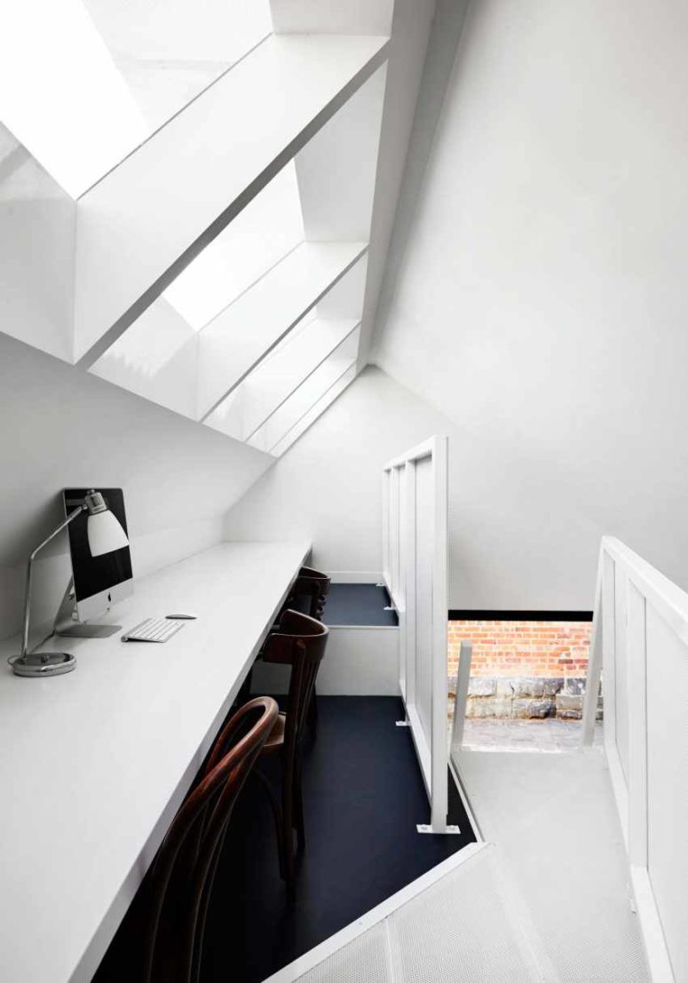 A small attic workspace is above the kitchen, and here you won't see any bold shades