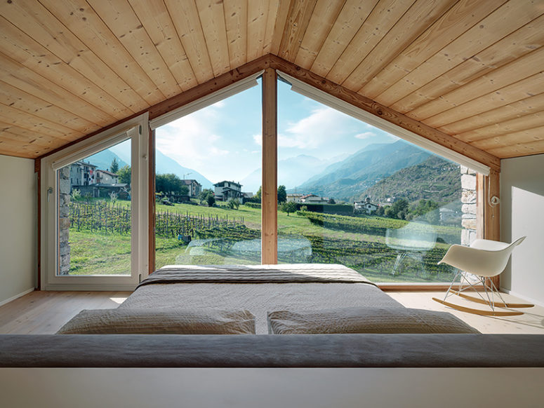 Look at this picturesque landscape, and the large window fills the bedroom with light